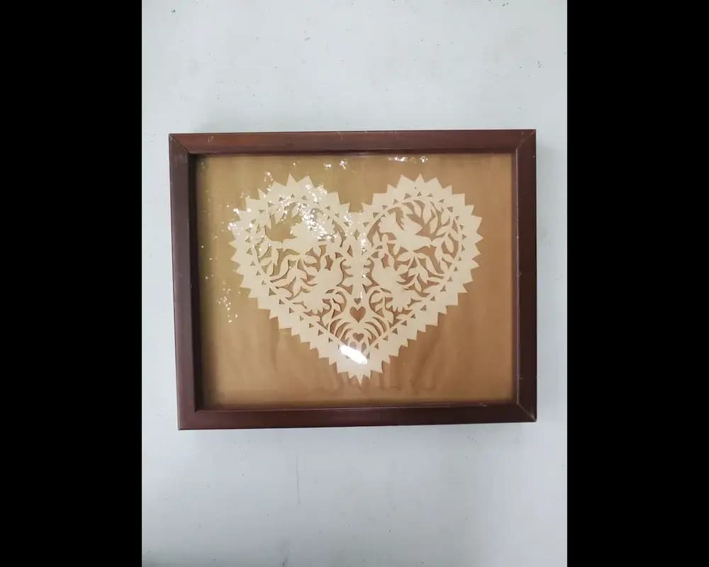 Vintage paper cut heart art